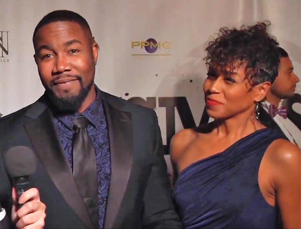 Movie Star Michael Jai White talking to media on red carpet at movie premier event