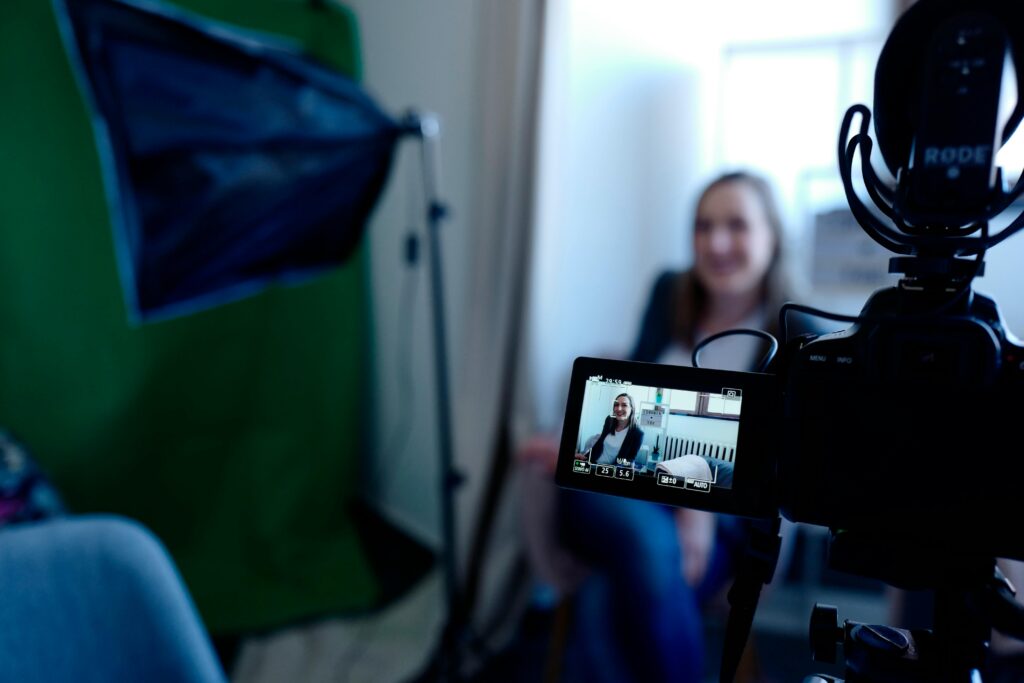 Actor being recorded in a professional studio setup, using video camera and lighting equipment. Learning how to become an actor with no experience