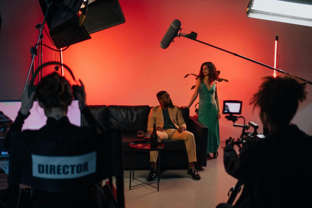 A dynamic film set with actors and crew actively engaged in a studio environment to learn how to become an actor with no experience.