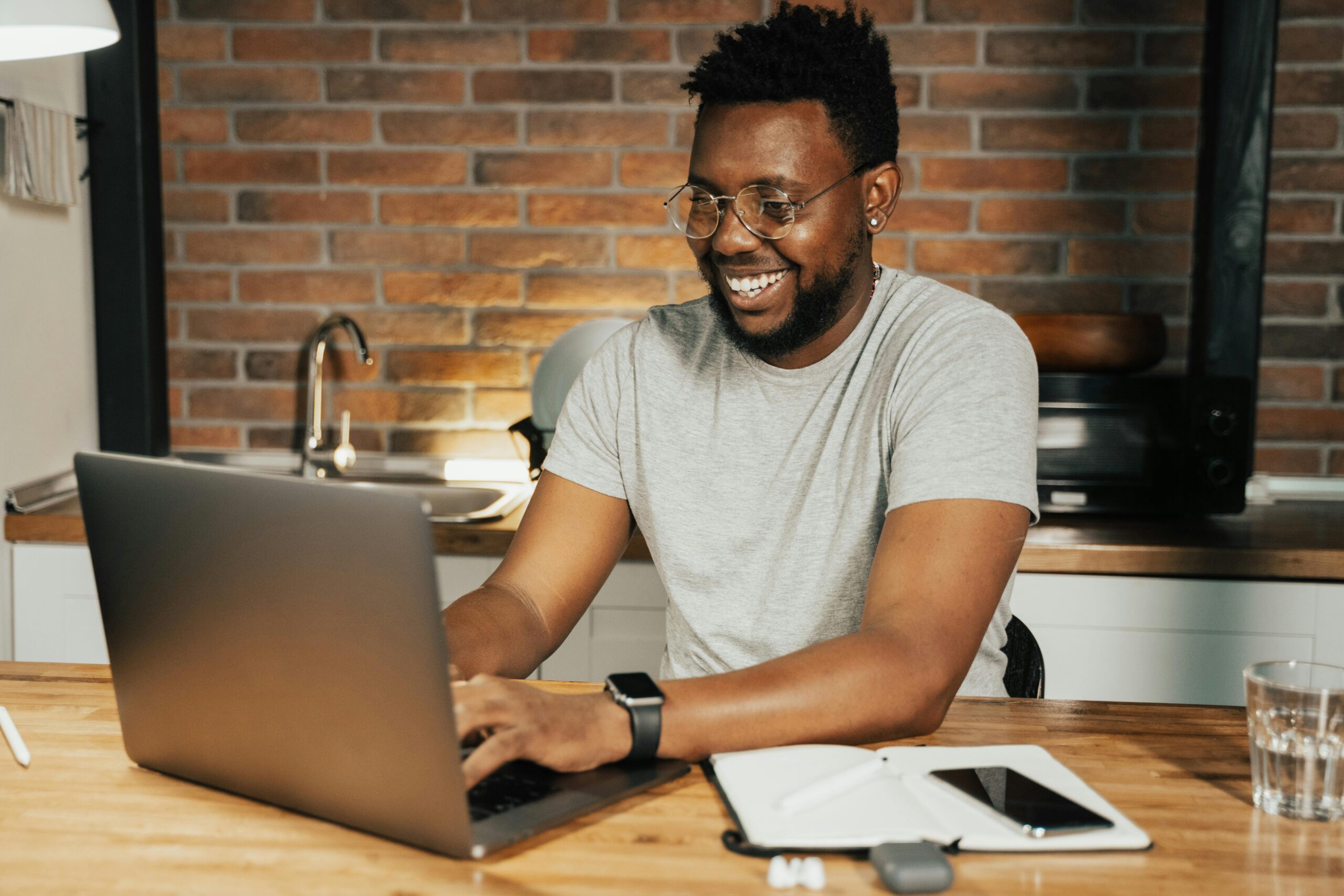 Actor getting ready to take online acting classes from home on his laptop.