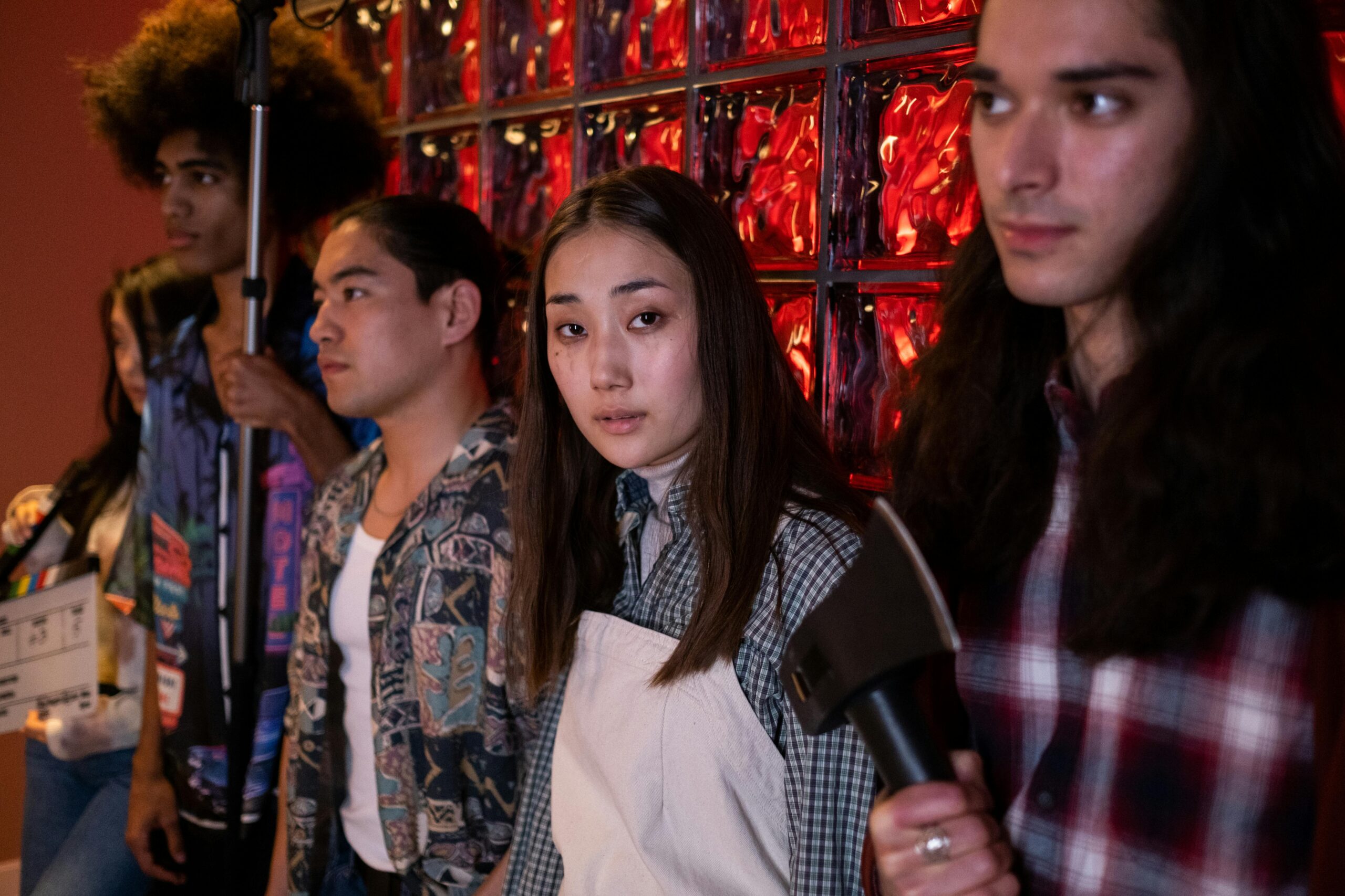 A group of diverse actors on a film set as an assignment for their acting classes